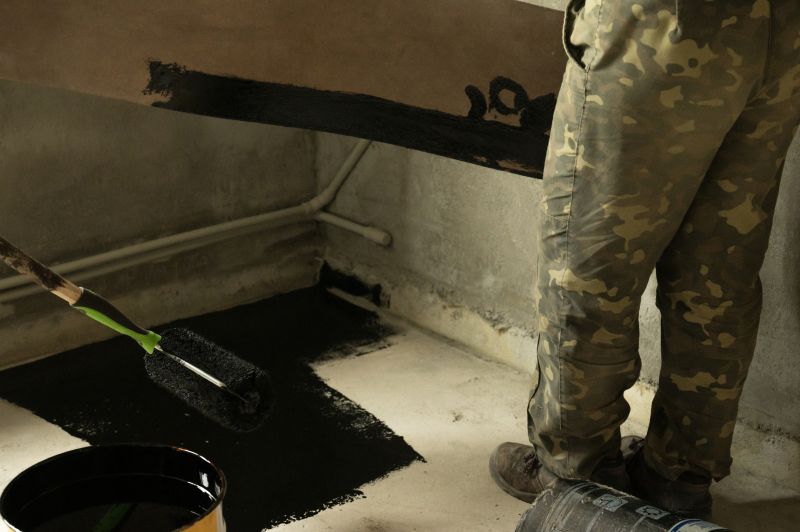 Local Basement Waterproofing pros at work